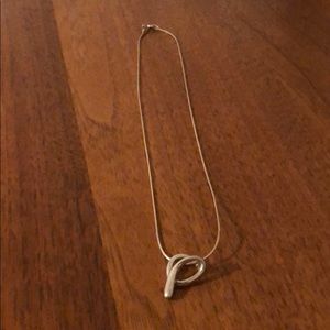 Sterling silver cursive initial “a” necklace